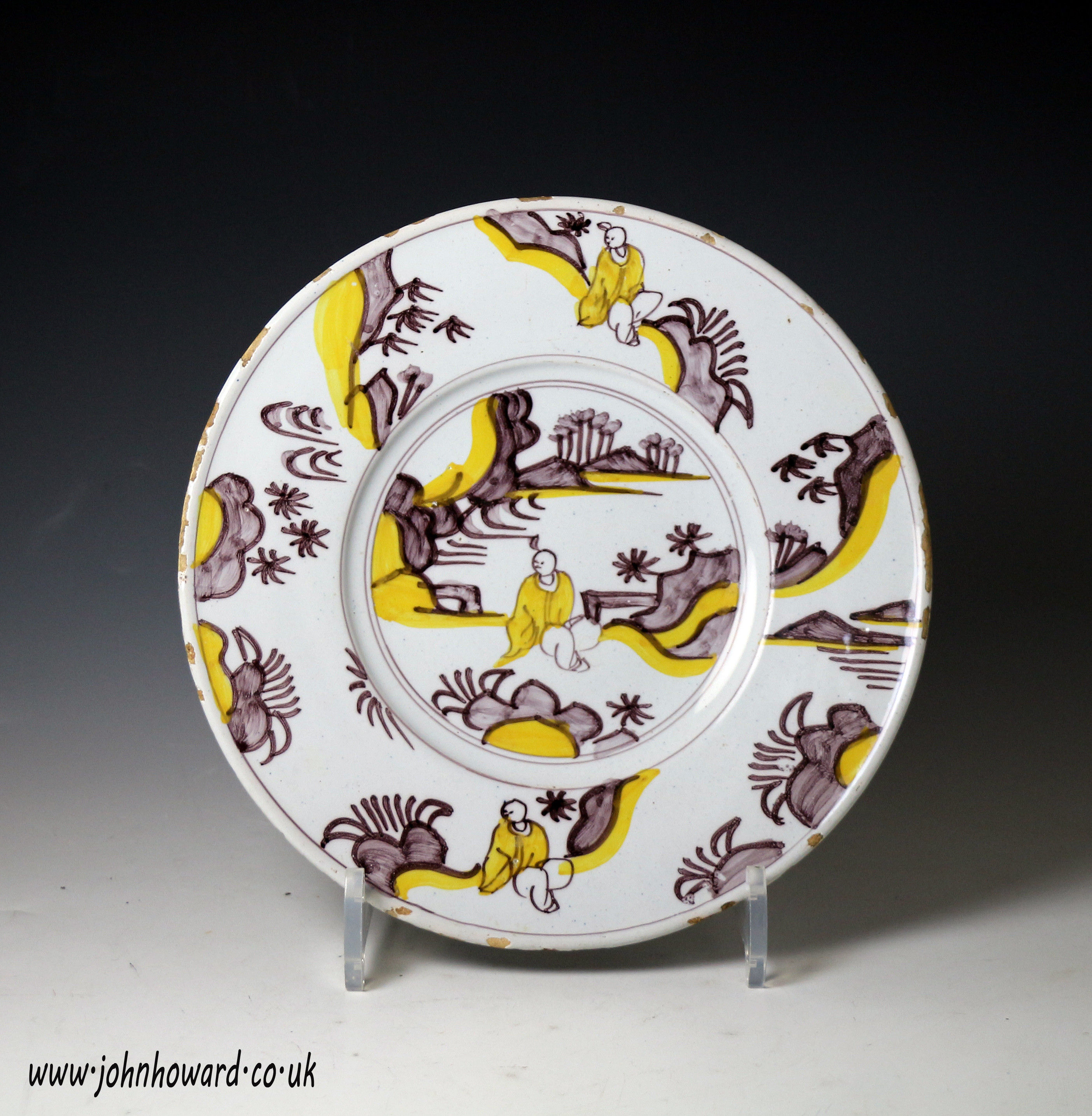 17th Century delfware English pottery plate with Ming Style decoration in yellow and manganese