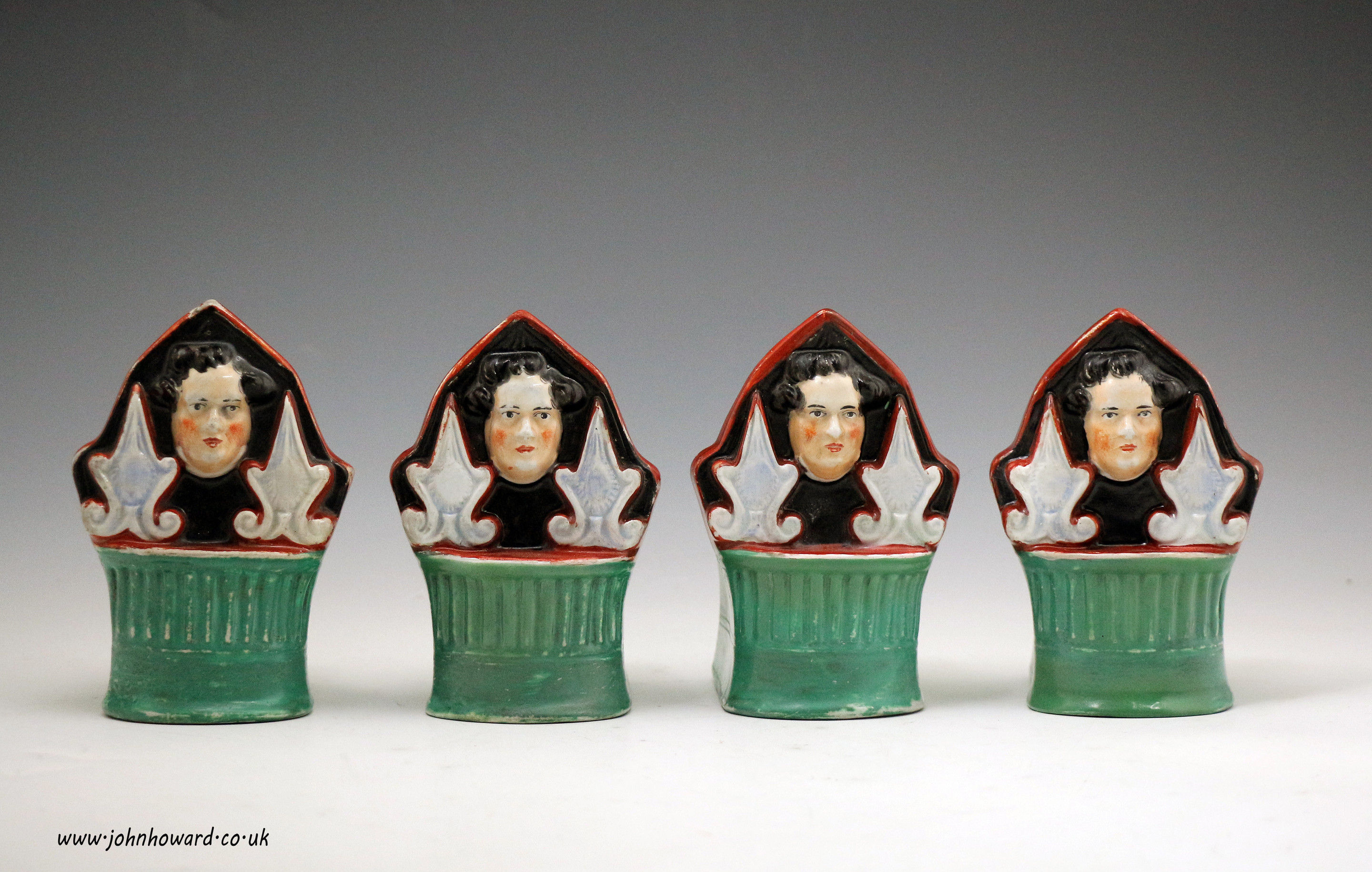 Staffordshire pottery furniture rests with head of King George 1V circa 1835