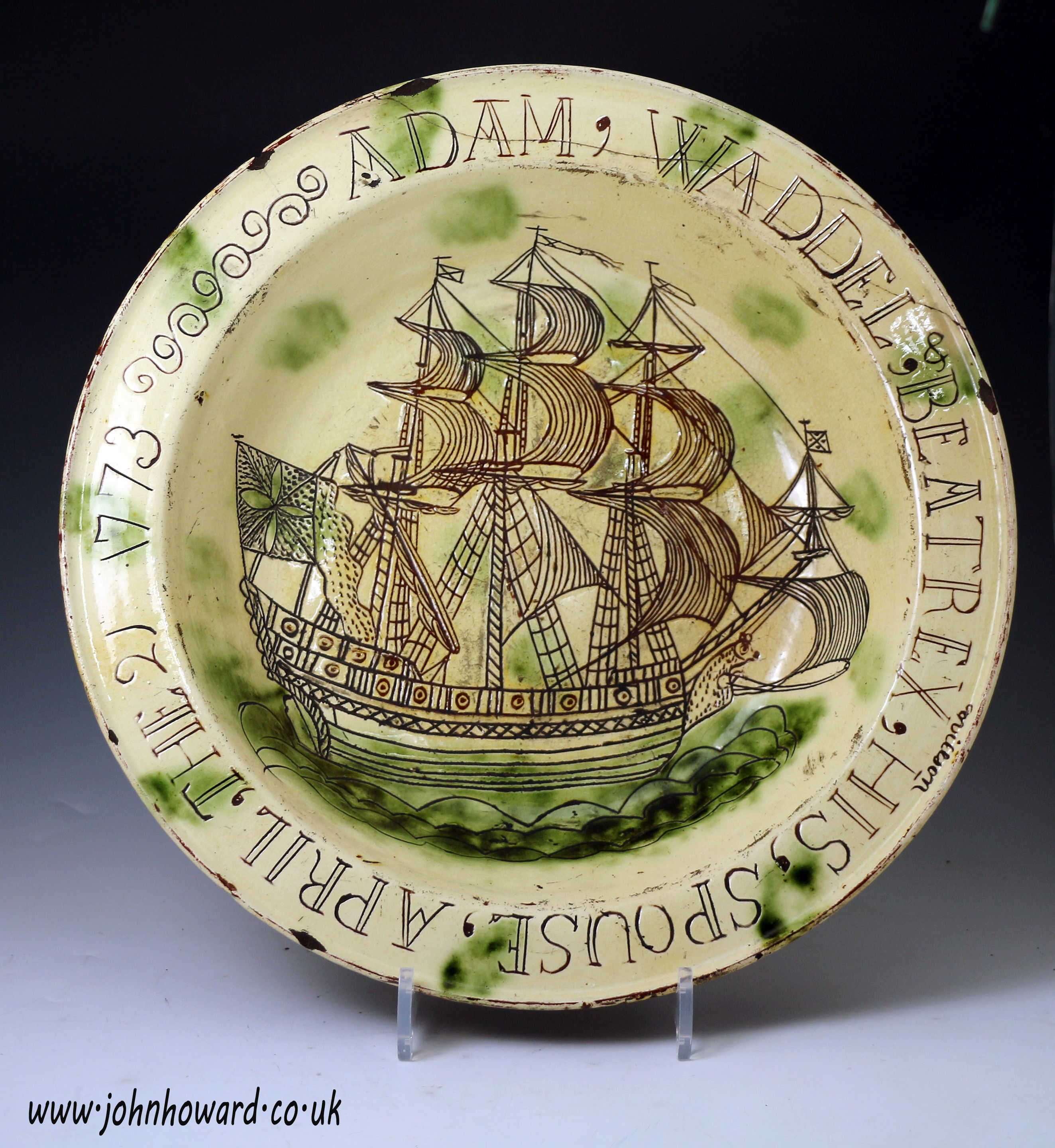 Large Scottish earthenware  dish scraffito decorated with a fully rigged sailing,the rim named and dated 1773 Adam Waddel and Beatrex Willson 