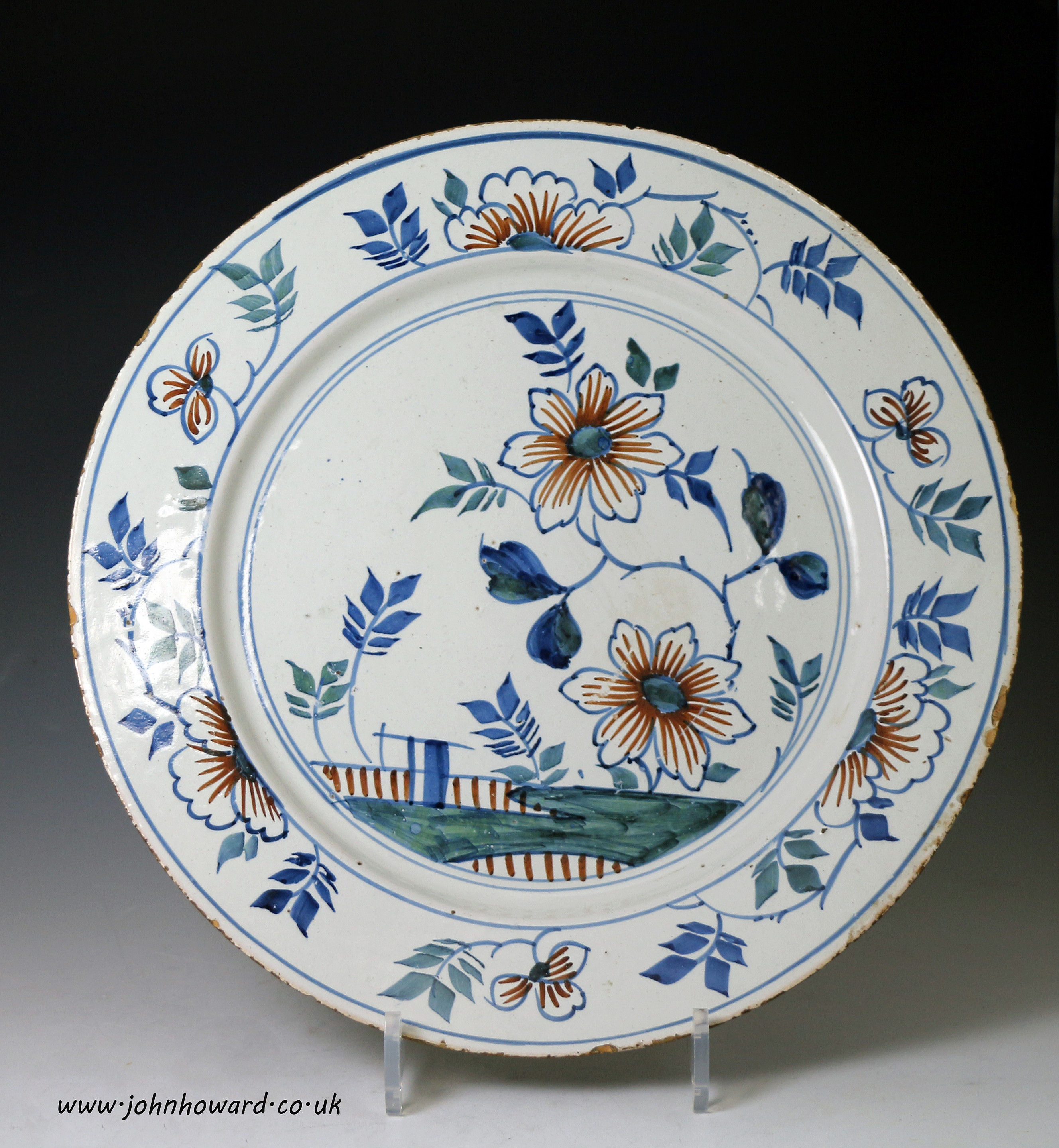 English delftware pottery polychrome decorated dish. Attributed Bristol early 18th century