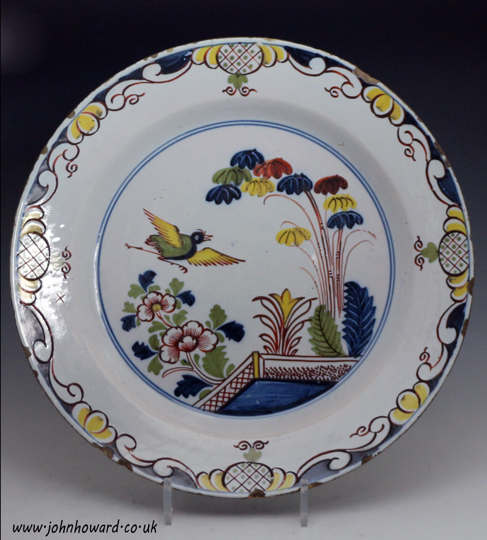 Antique period delftware earthenware charger early 18th century polychrome decorated