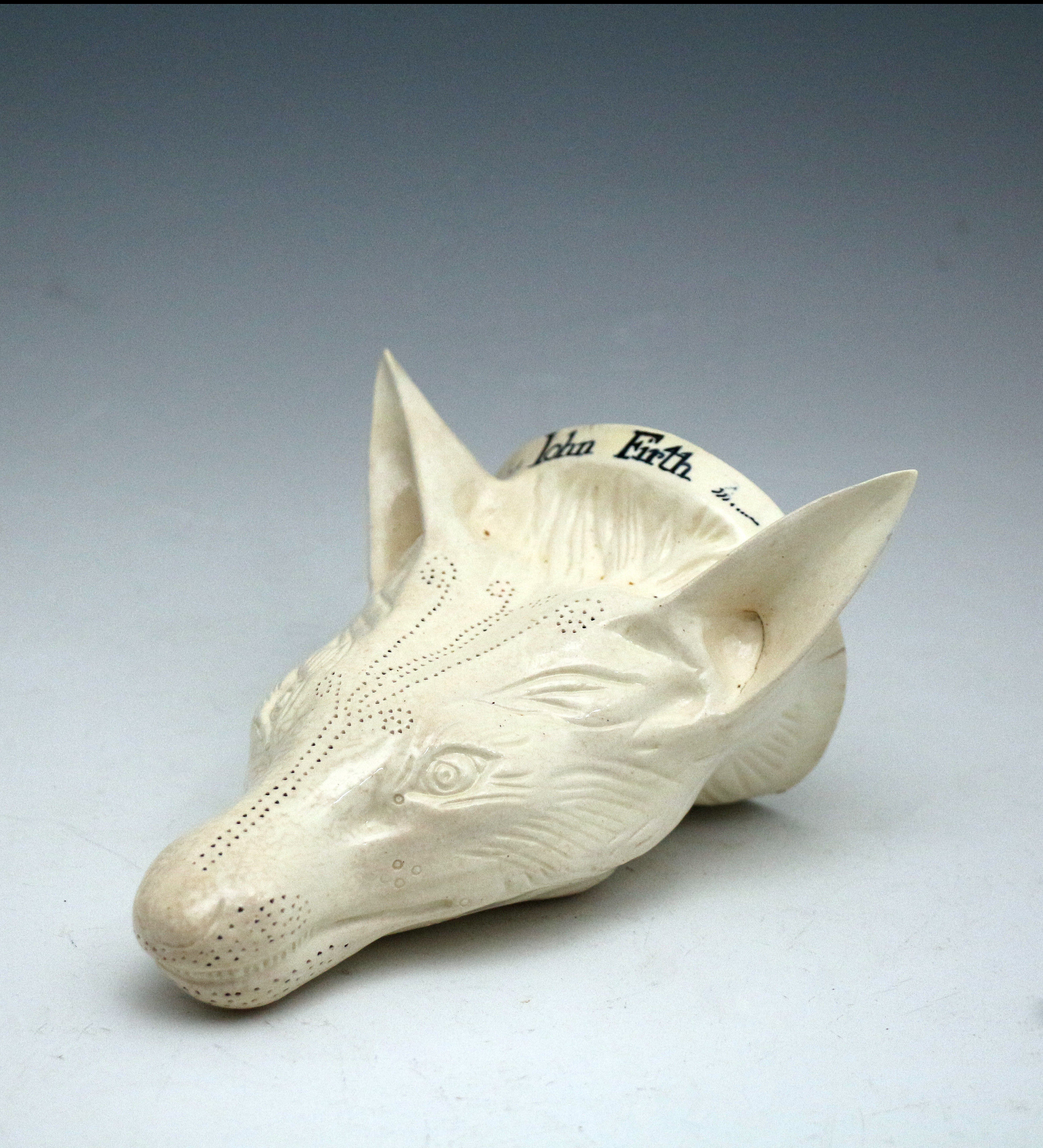 Antique English creamware pottery fox head stirrup cup named  JOHN FIRTH. c1775