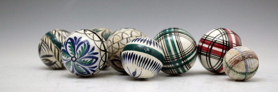 Eight rare miniature Pottery carpet balls (the largest 1.75 diameter) mid 19th century.