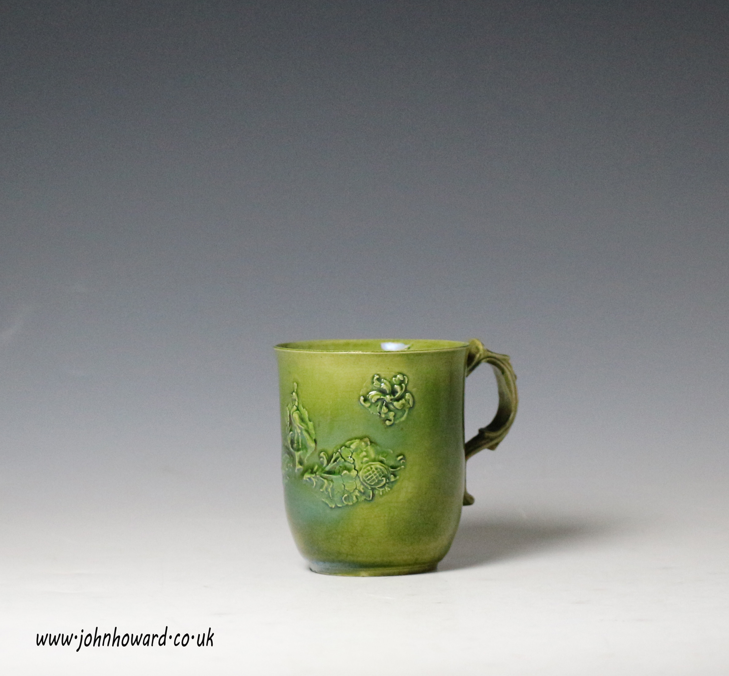 Coffee Cup. Staffordshire green glazed creamware made in mid 18th century