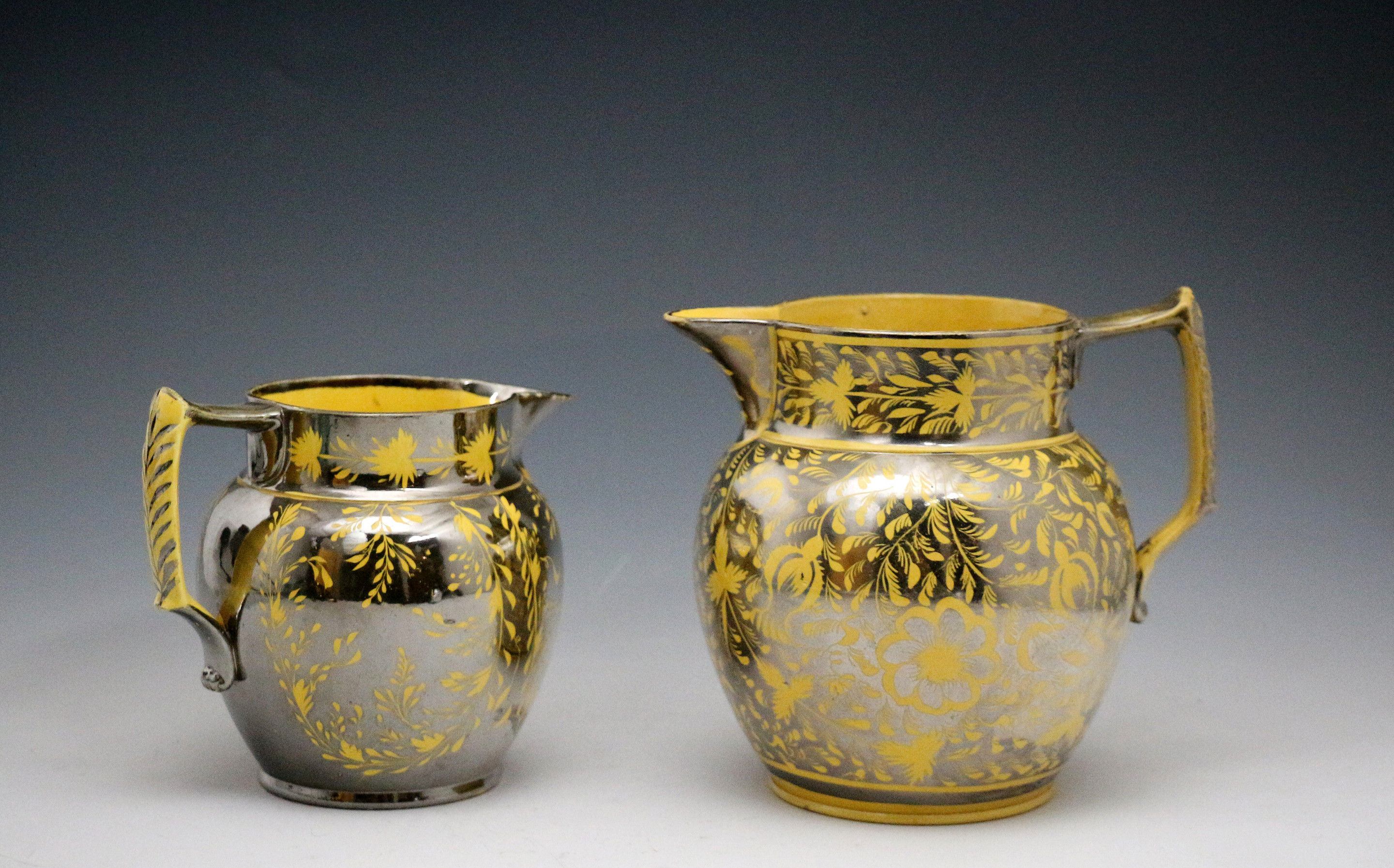 English pottery yellow ground pitchers with silver luster resist decoration early 19th century
