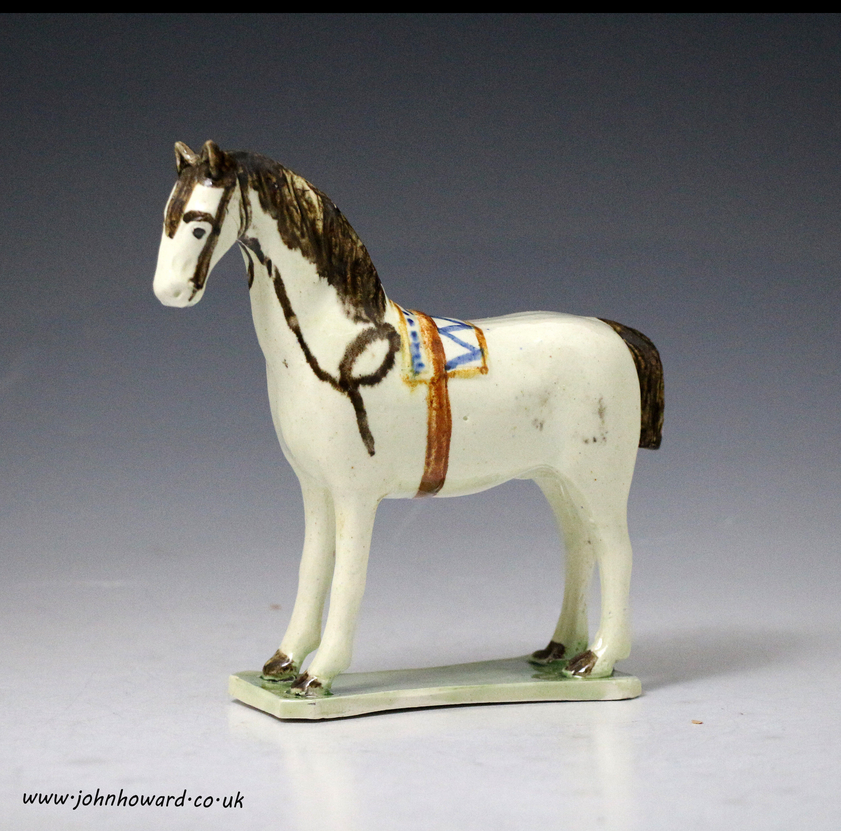 Antique English pottery figure of a horse in Prattware circa 1790/1800 period