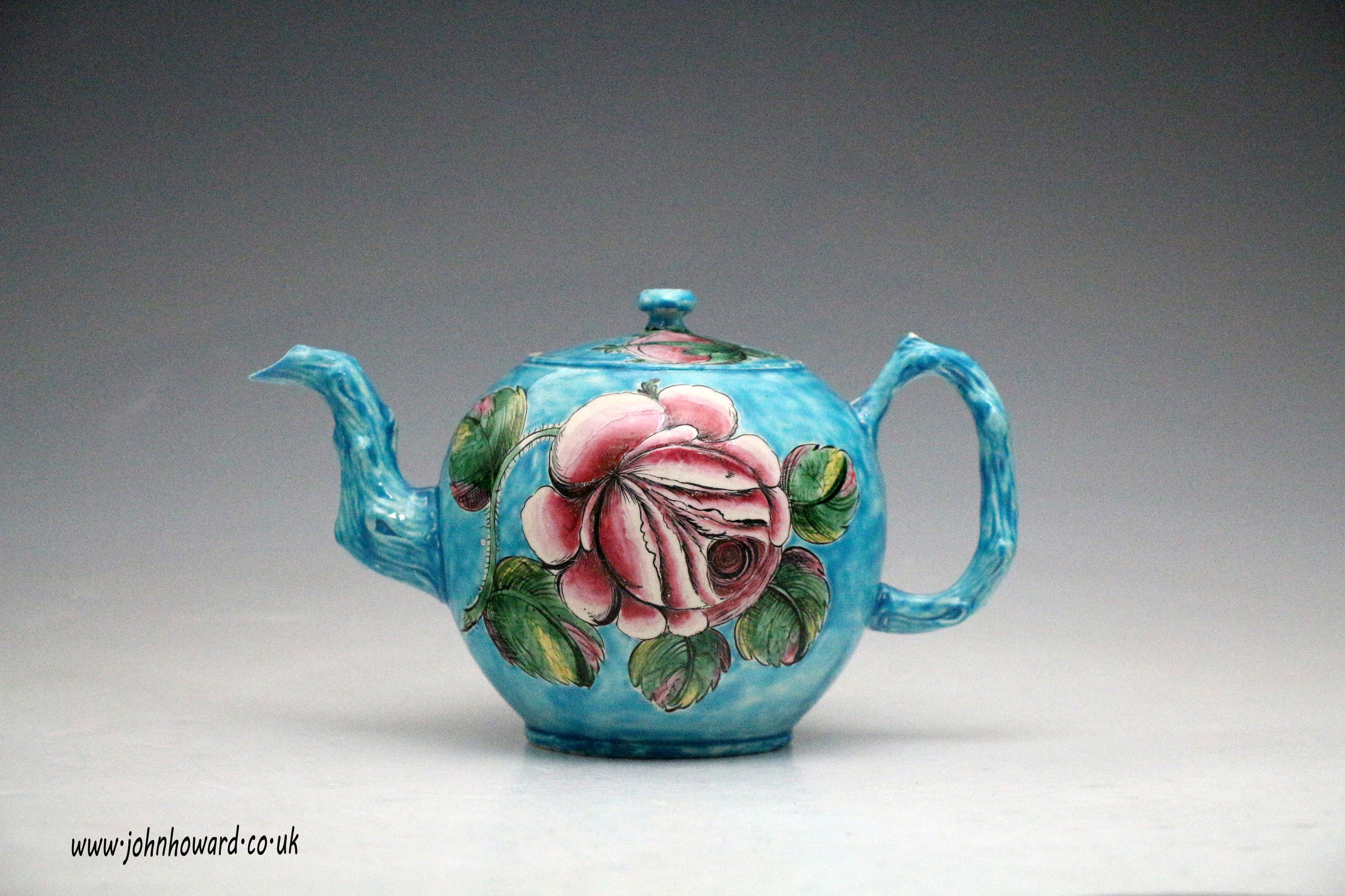 Staffordshire saltglaze stoneware enamel decorated teapot  18th century English.